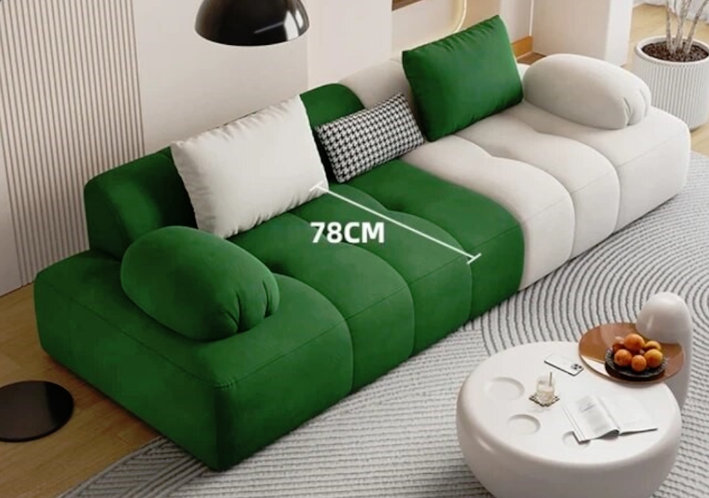 Australian home design trends featuring a modern green and white modular sofa in a stylish living room